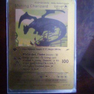 1st edition Shining Charizard gold foil